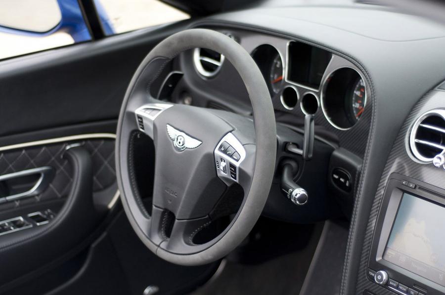 Bentley Continental SuperSports Convertible 2012 года  (фото 21 из 39)